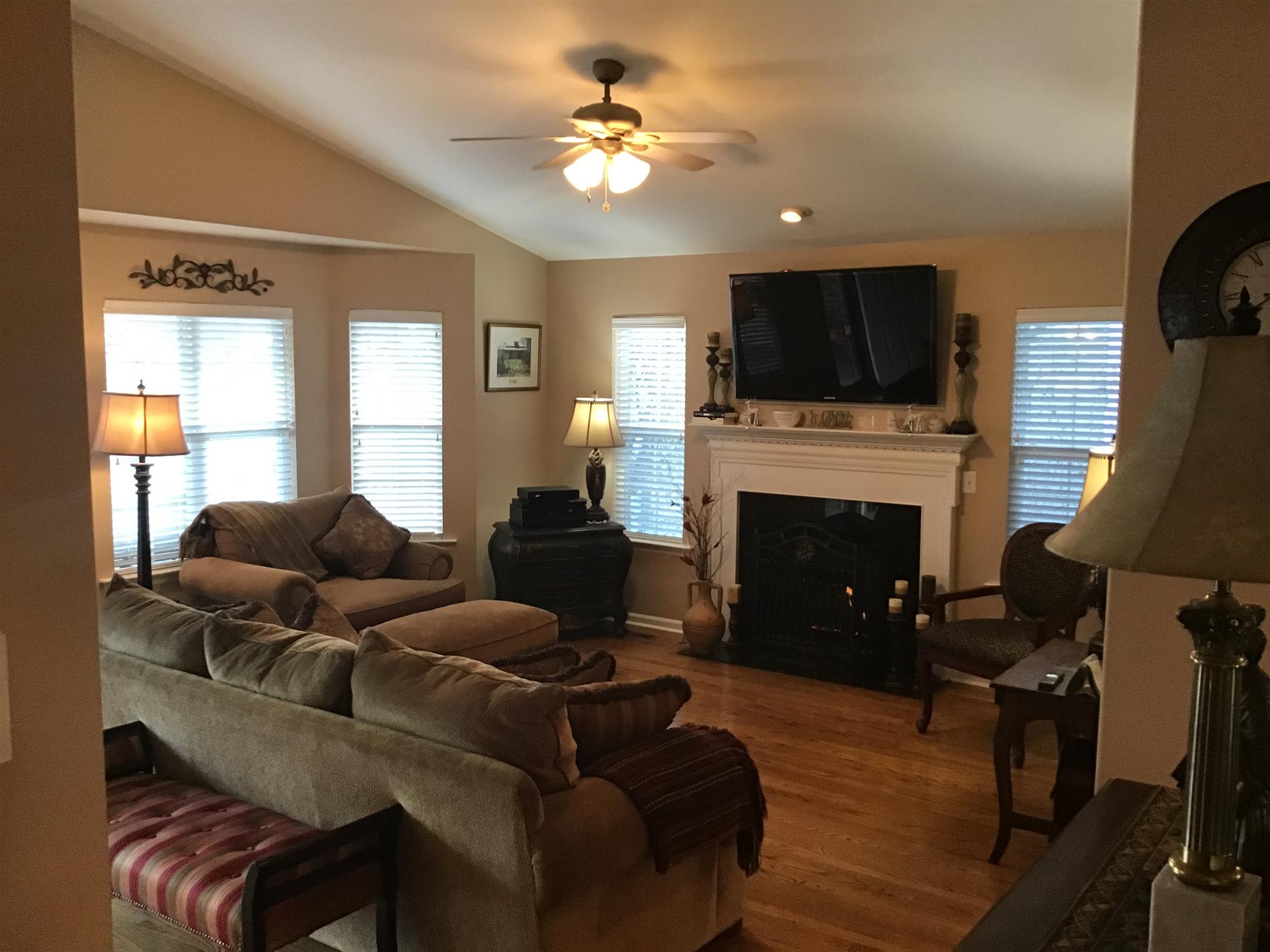 1108 Paris Avenue Nashville, TN 37204 - Photo 15 of 30 a living room with furniture a fireplace and a flat screen tv