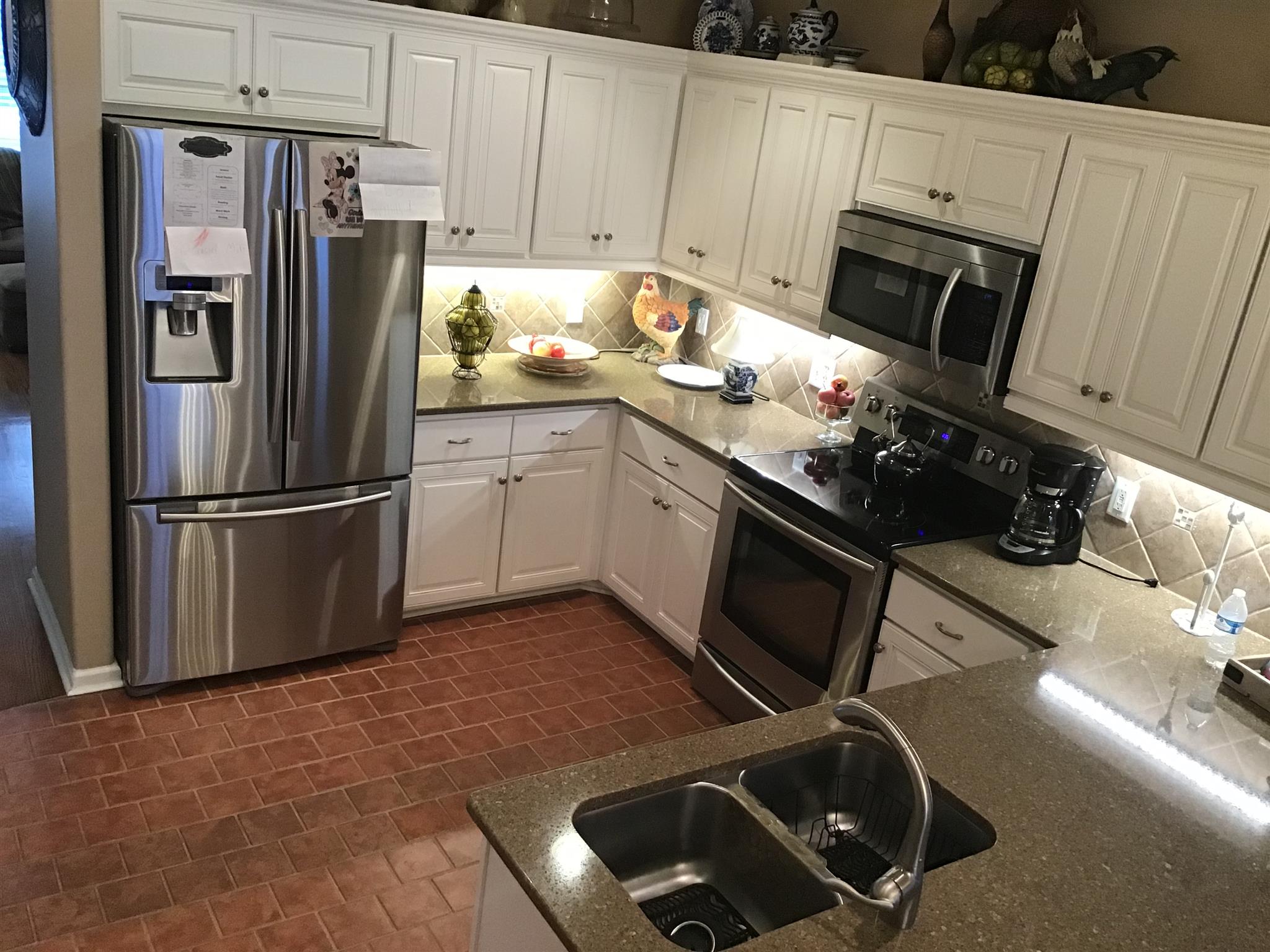 1108 Paris Avenue Nashville, TN 37204 - Photo 17 of 30 a kitchen with a sink appliances and cabinets