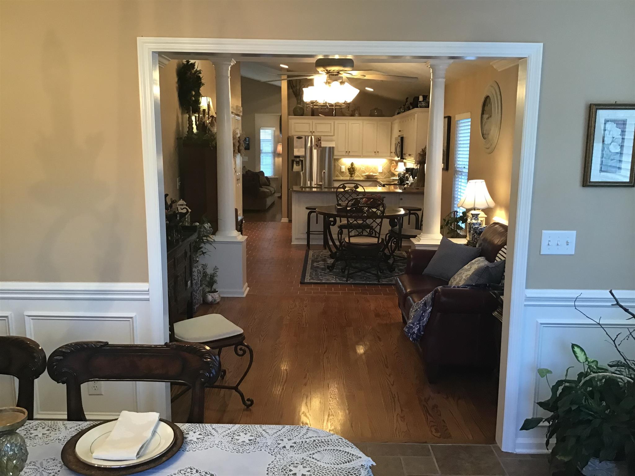 1108 Paris Avenue Nashville, TN 37204 - Photo 20 of 30 a living room with furniture and a chandelier