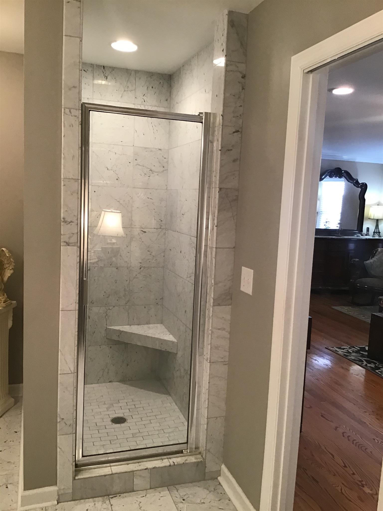1108 Paris Avenue Nashville, TN 37204 - Photo 22 of 30 a bathroom with a glass shower door