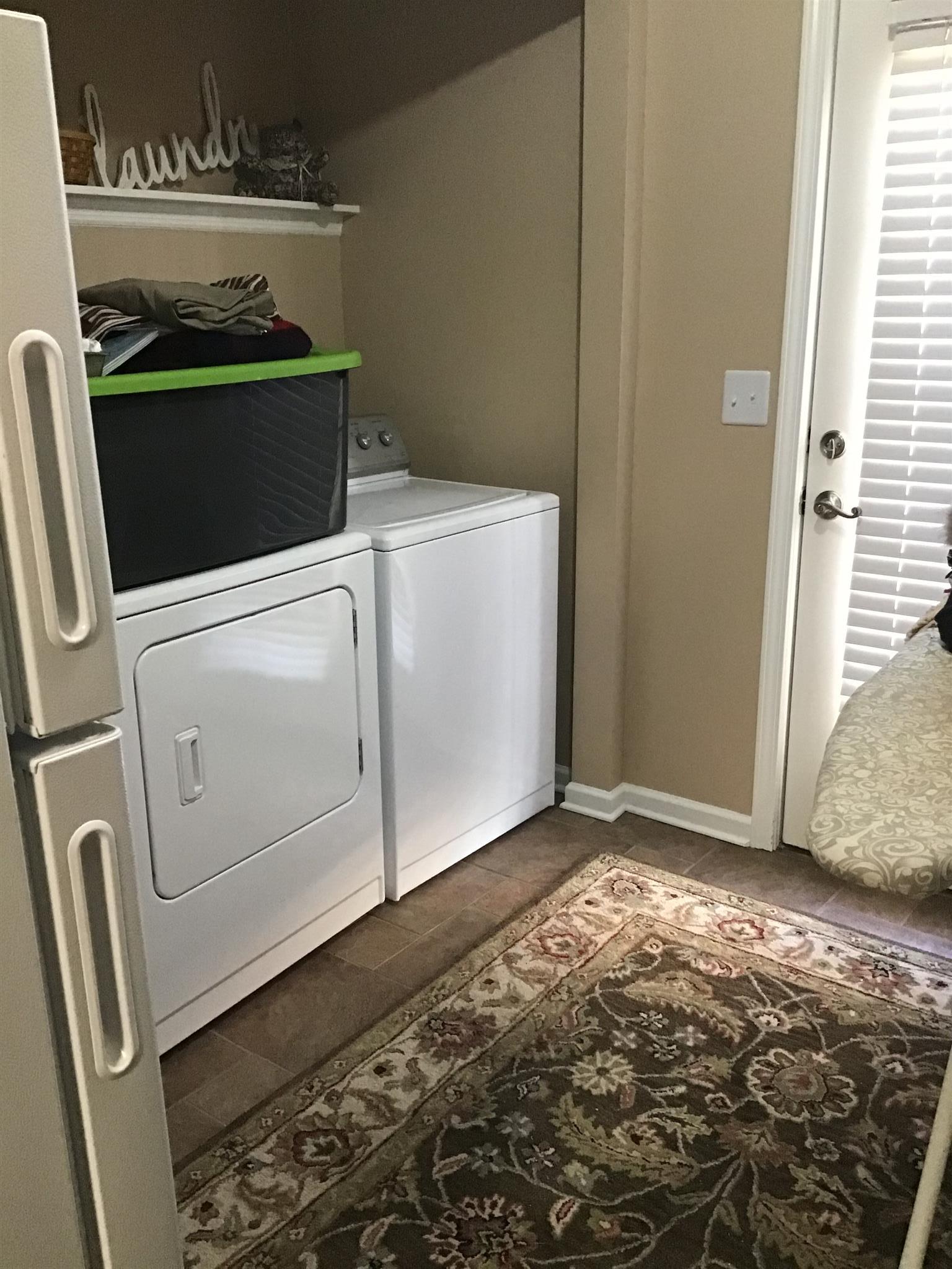 1108 Paris Avenue Nashville, TN 37204 - Photo 24 of 30 a utility room with dryer and washer