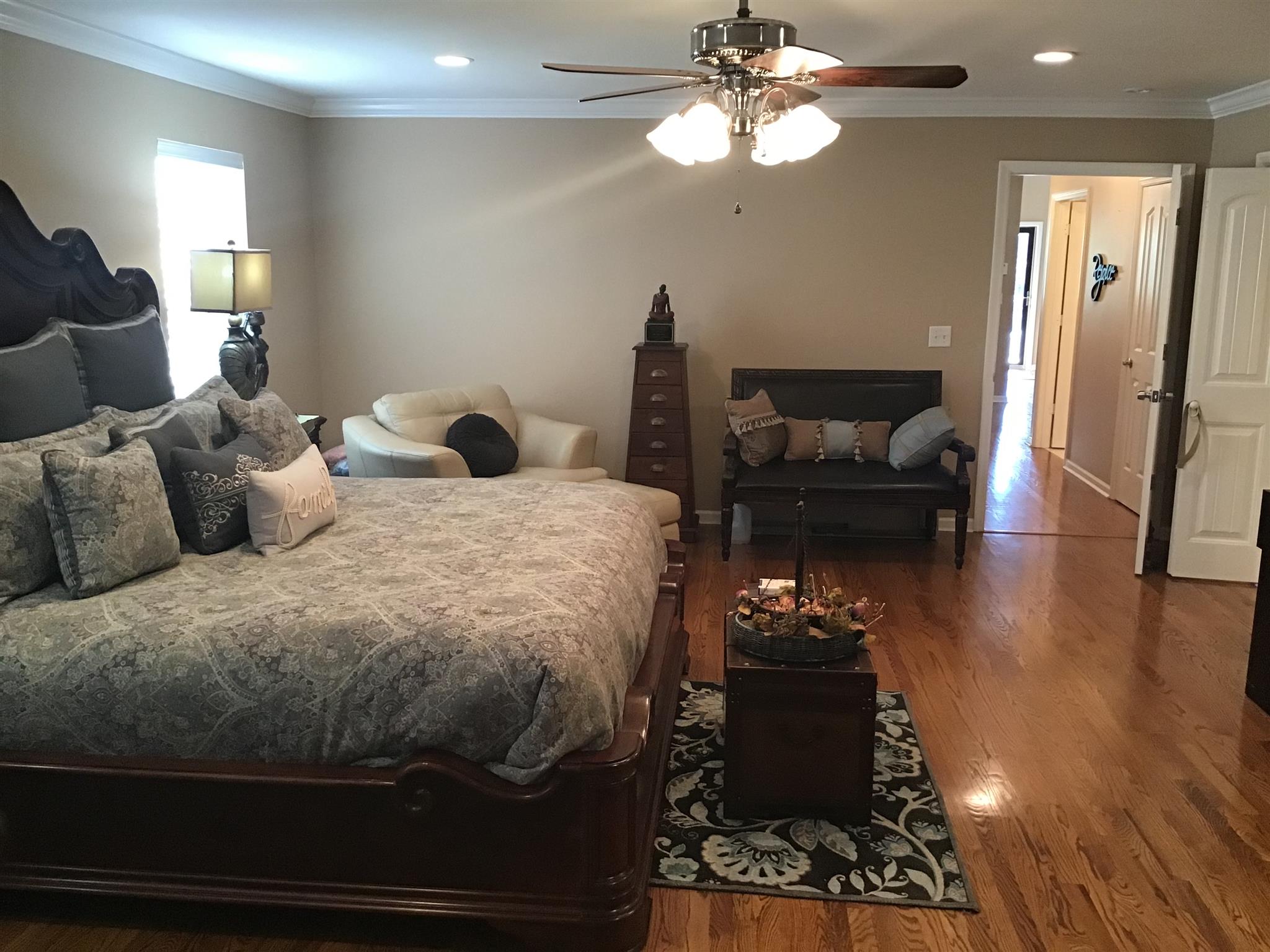 1108 Paris Avenue Nashville, TN 37204 - Photo 25 of 30 a bedroom with a bed and wooden floor
