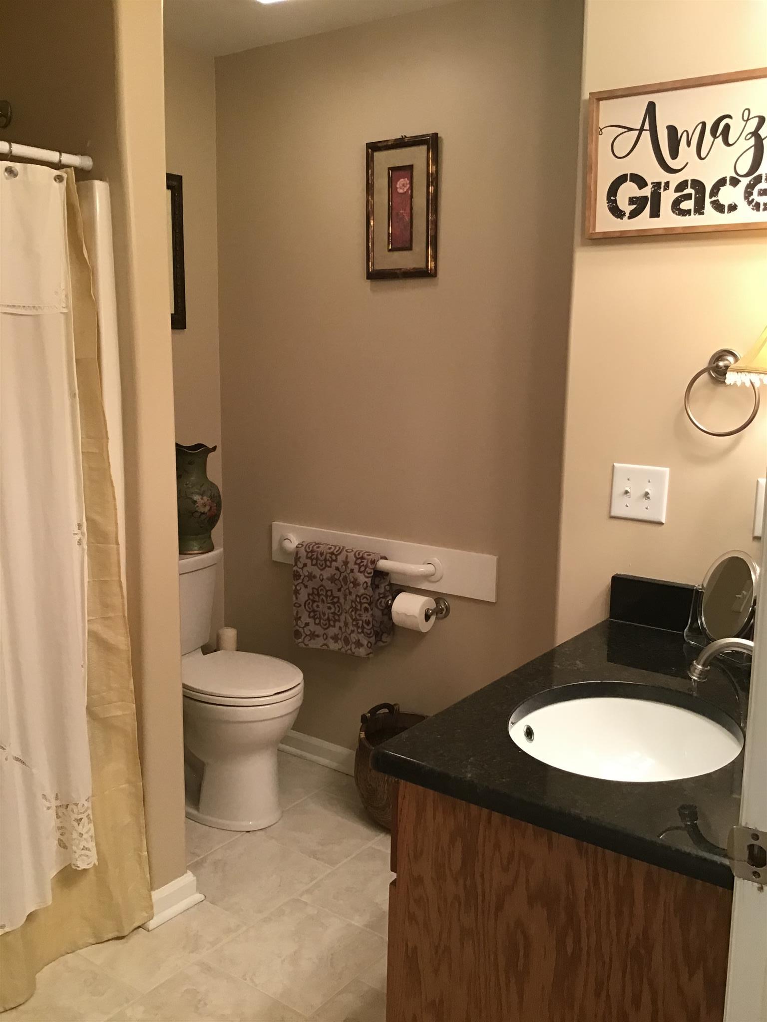 1108 Paris Avenue Nashville, TN 37204 - Photo 26 of 30 a bathroom with a toilet and a sink