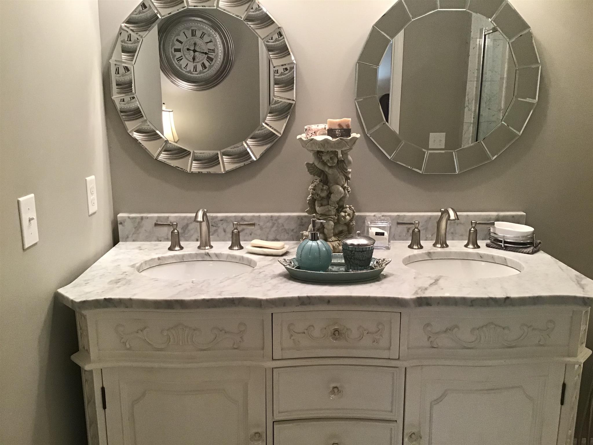 1108 Paris Avenue Nashville, TN 37204 - Photo 9 of 30 a bathroom with a double vanity and a mirror