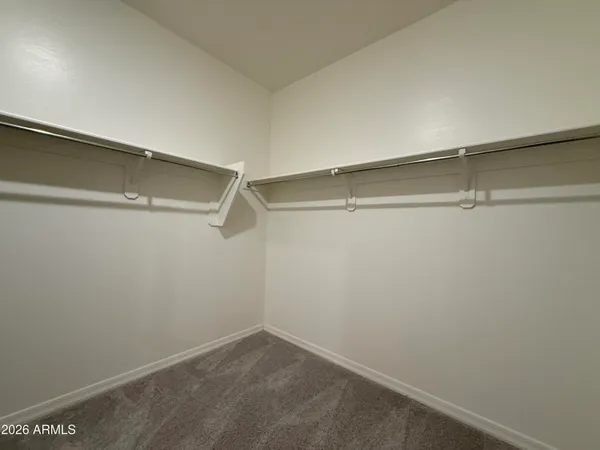 a view of an empty walk in closet