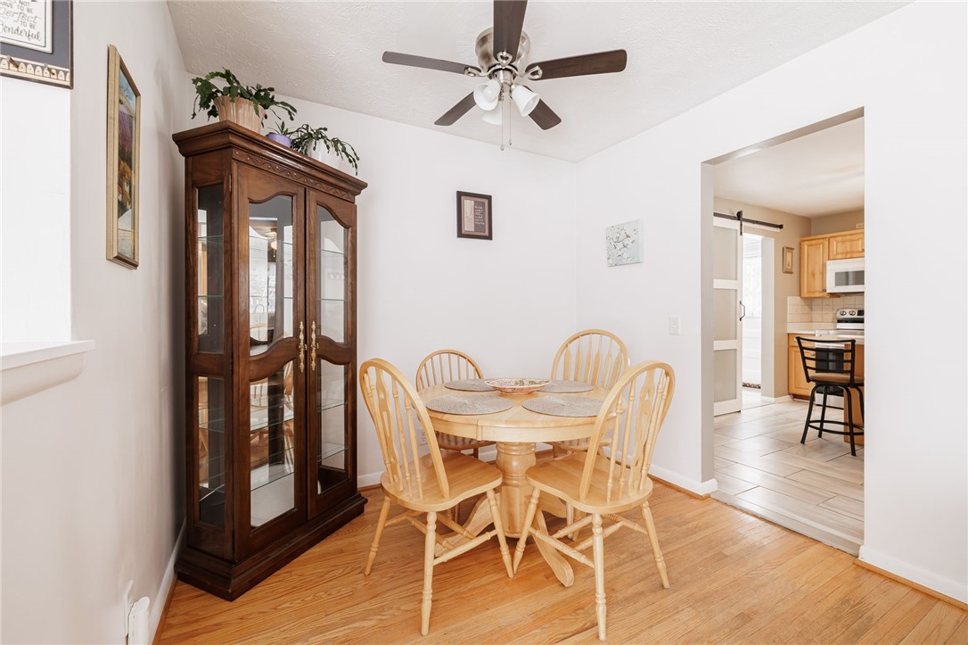 1572 Scribner Road Penfield, NY 14526 - Photo 11 of 32 Dining space off living room.