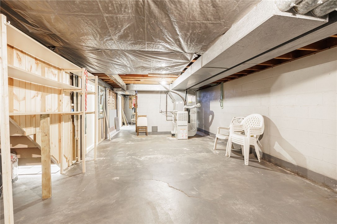 1572 Scribner Road Penfield, NY 14526 - Photo 29 of 32 Large basement area for storage.