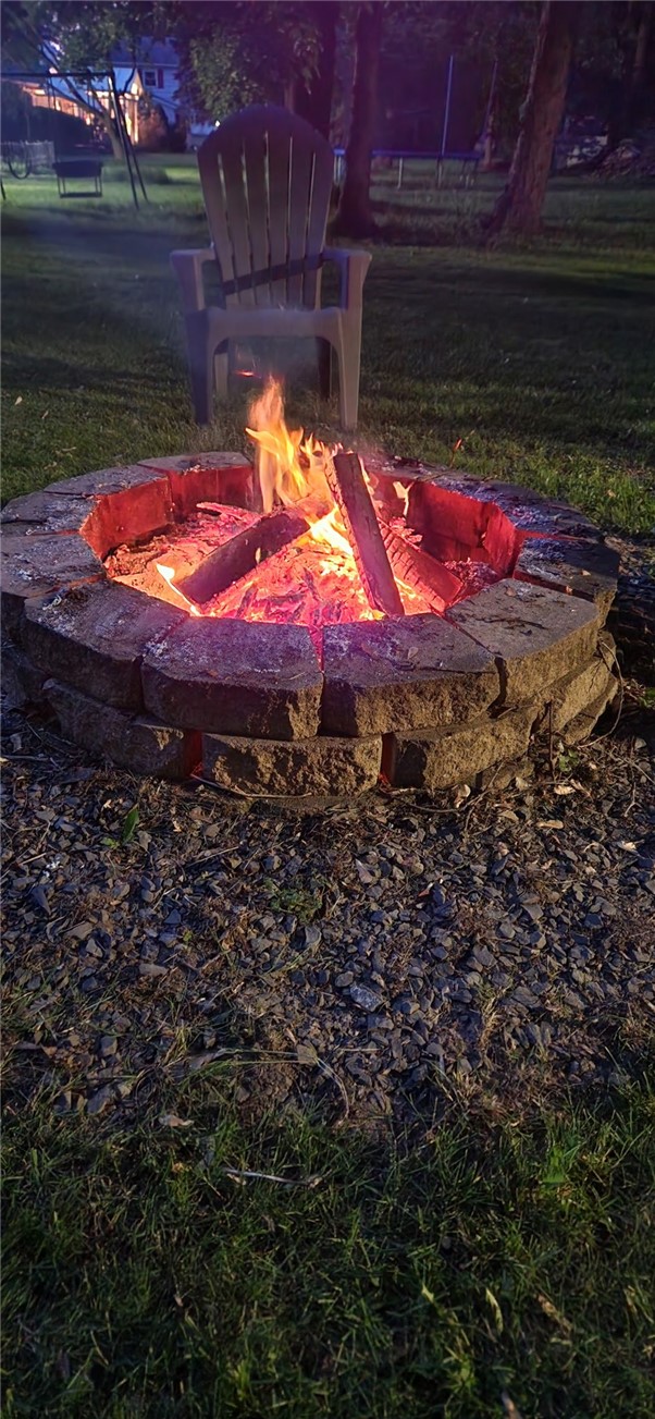 1572 Scribner Road Penfield, NY 14526 - Photo 32 of 32 FIre pit in the summertime.