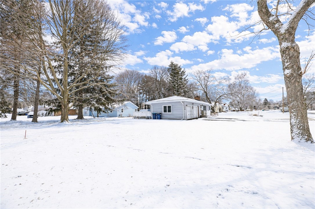 1572 Scribner Road Penfield, NY 14526 - Photo 5 of 32 Side yard view from Scribner Rd.