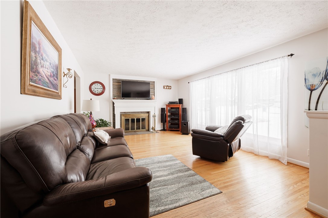 1572 Scribner Road Penfield, NY 14526 - Photo 8 of 32 Livingroom with beautiful picture window.