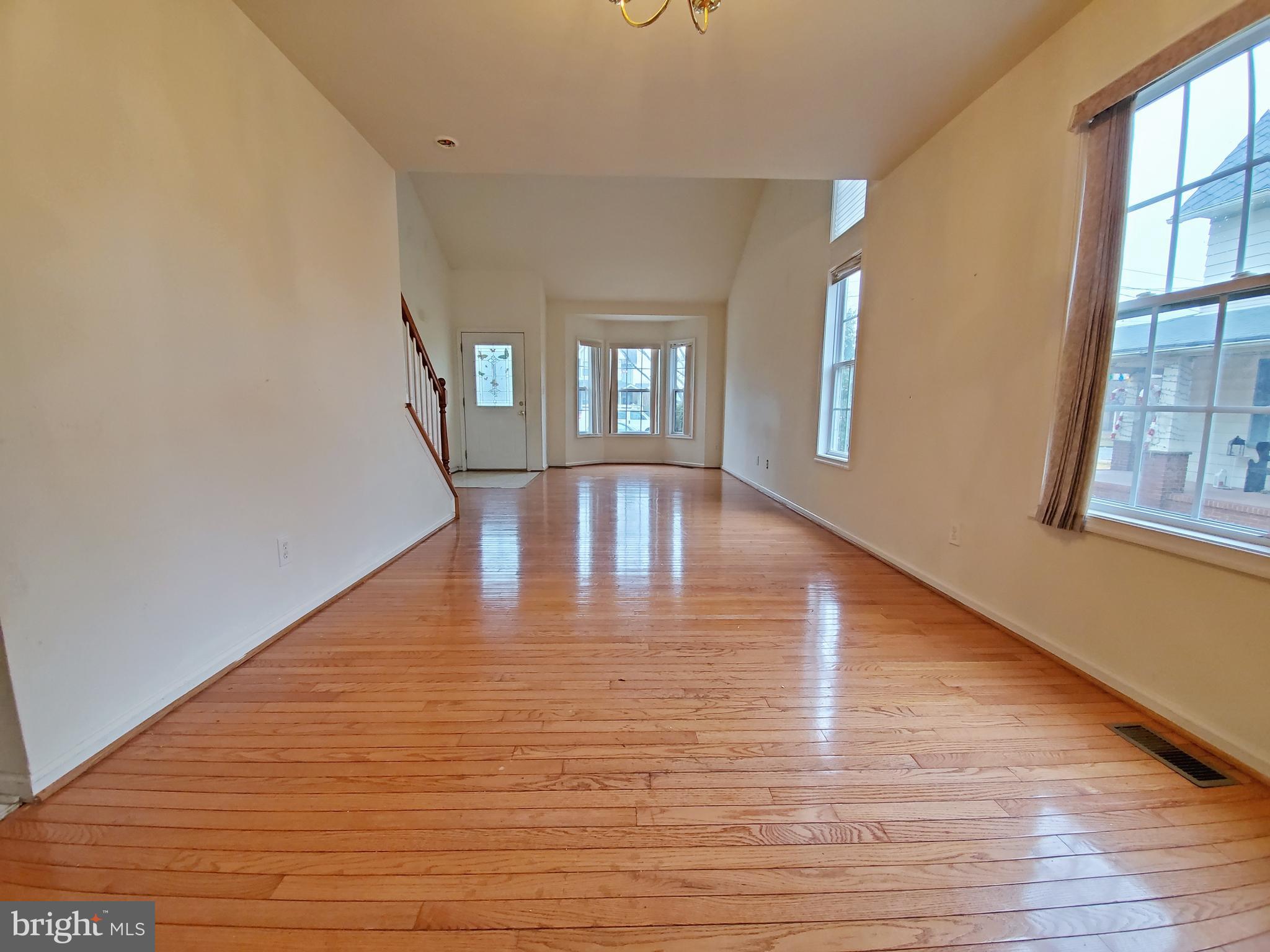 125 Heulings Avenue Riverside, NJ 08075 - Photo 6 of 24 Vaulted ceilings Living room / Dining room space