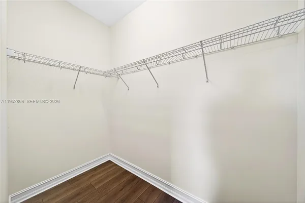 a view of a room with racks on the wall