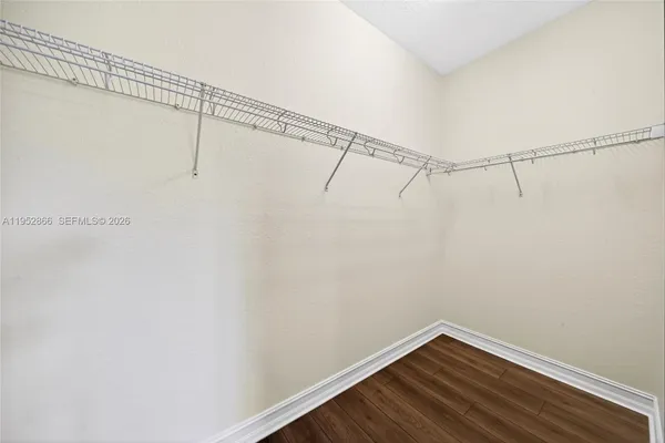 a view of a room with racks on the wall