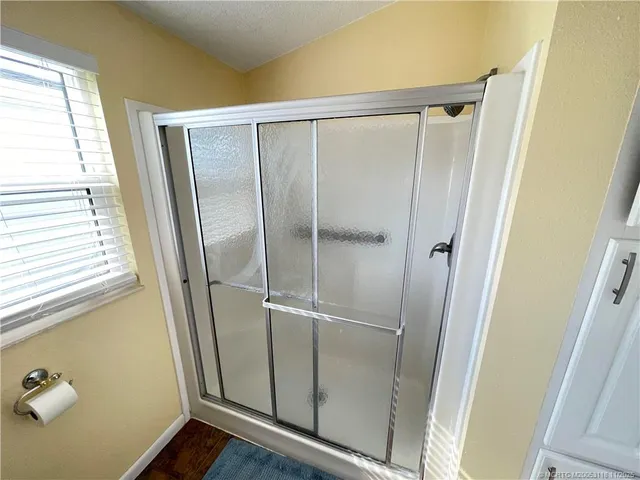 a view of a bedroom with washer and dryer