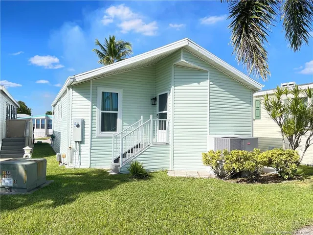 a view of a garden with houses