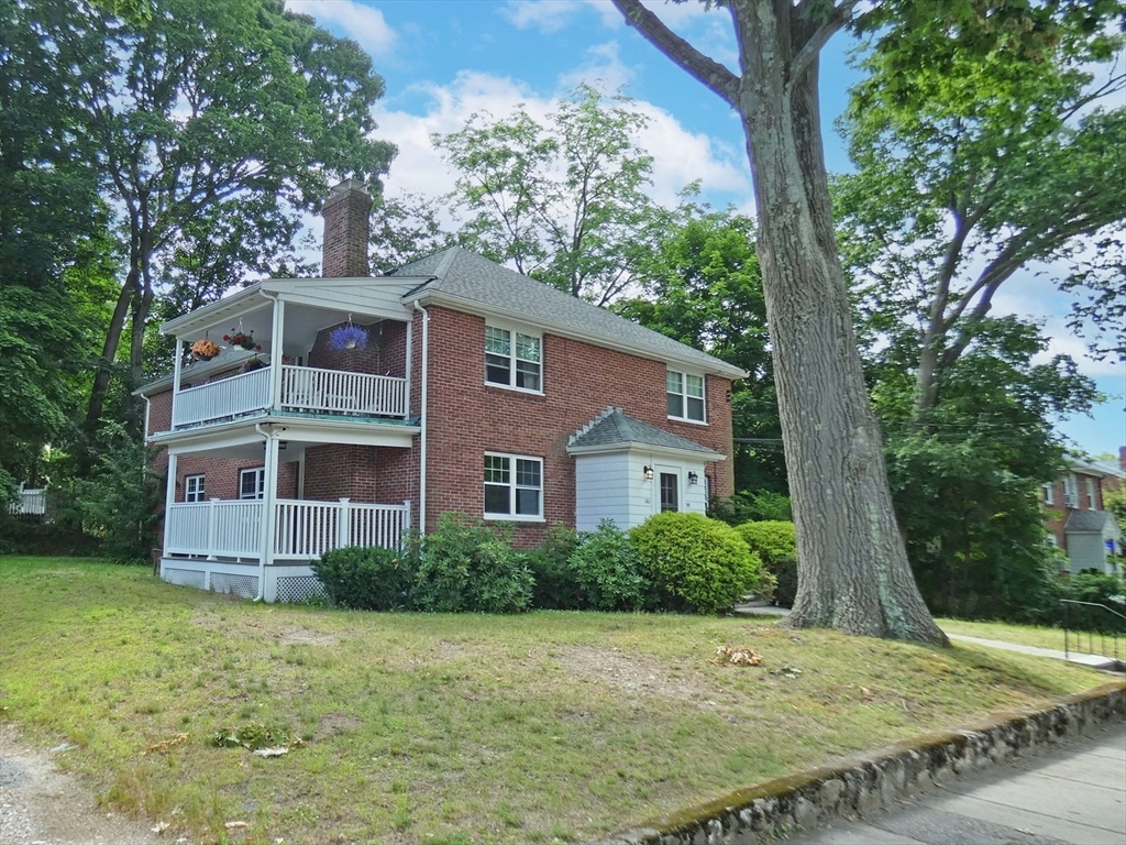 99 Withington Road Newton, MA 02460 - Photo 2 of 33 a front view of a house with garden