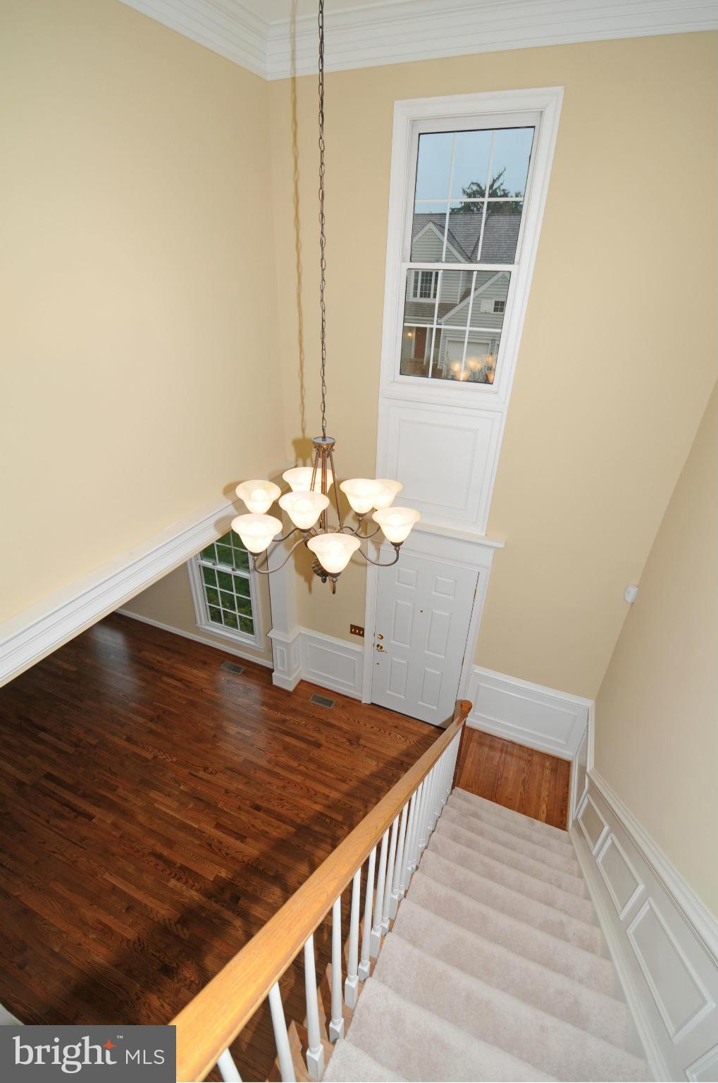 9731 Hidden Valley Road Vienna, VA 22181 - Photo 14 of 30 HARDWOOD STAIRS WITH CARPET UP TO BEDROOM LEVEL