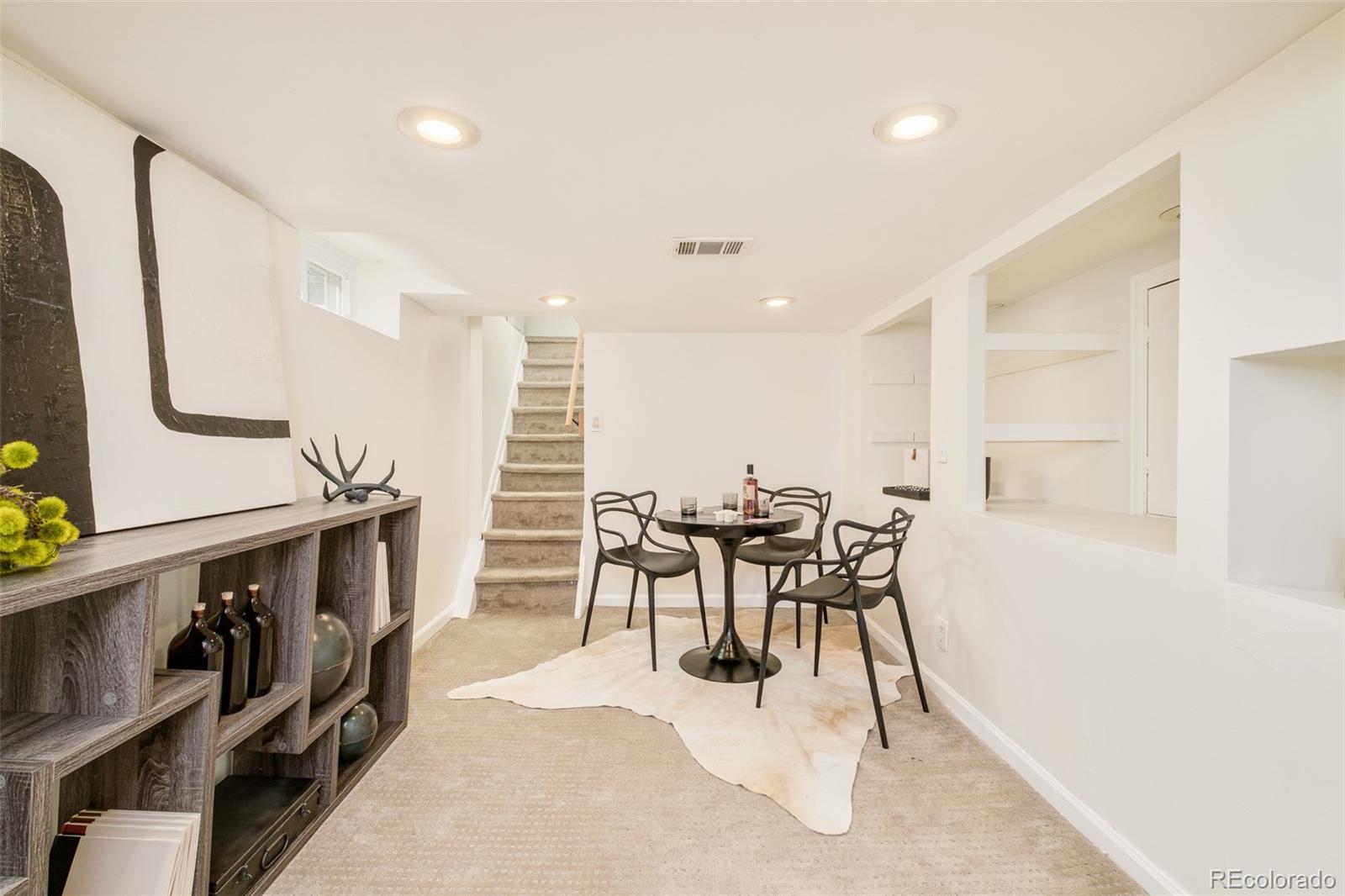 4635 Elm Court Denver, CO 80211 - Photo 20 of 28 a view of a dining room with furniture