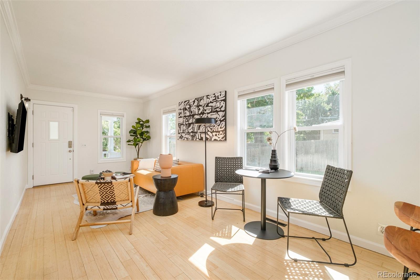 4635 Elm Court Denver, CO 80211 - Photo 6 of 28 a living room with furniture and a window