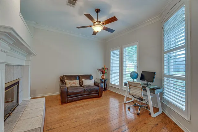 a work room with furniture and windows
