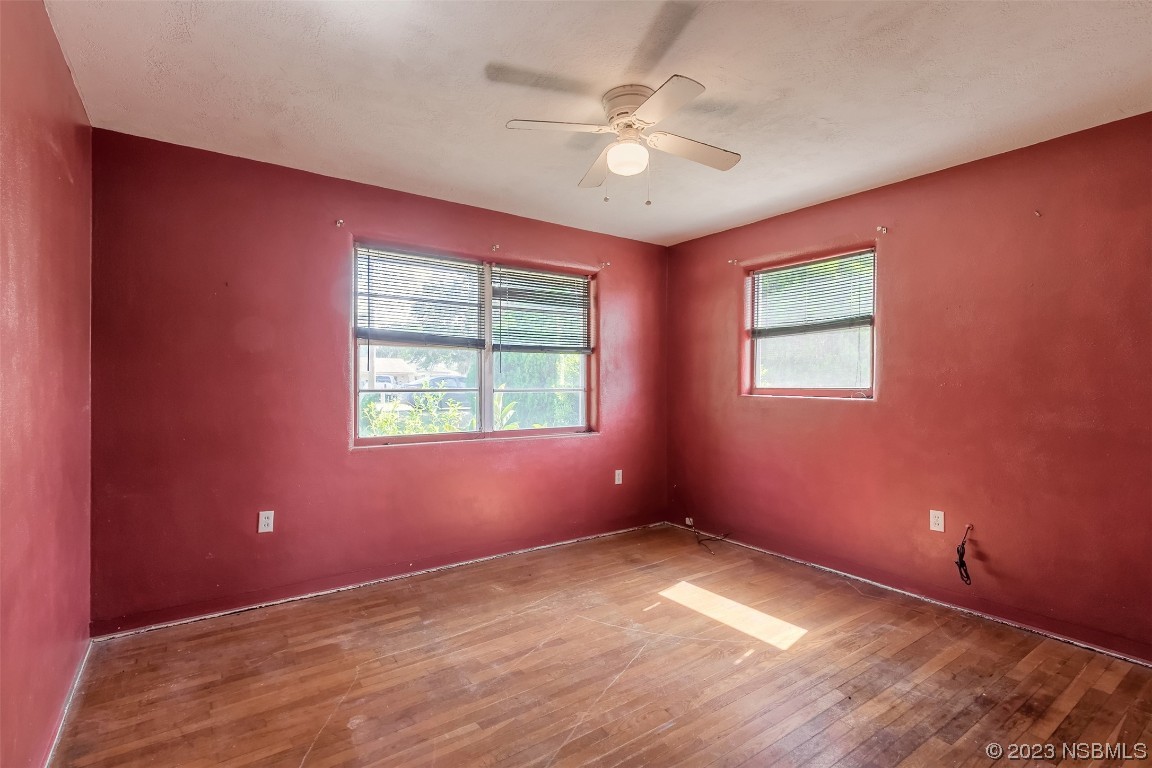 209 Pine Avenue Edgewater, FL 32141 - Photo 14 of 34 an empty room with windows