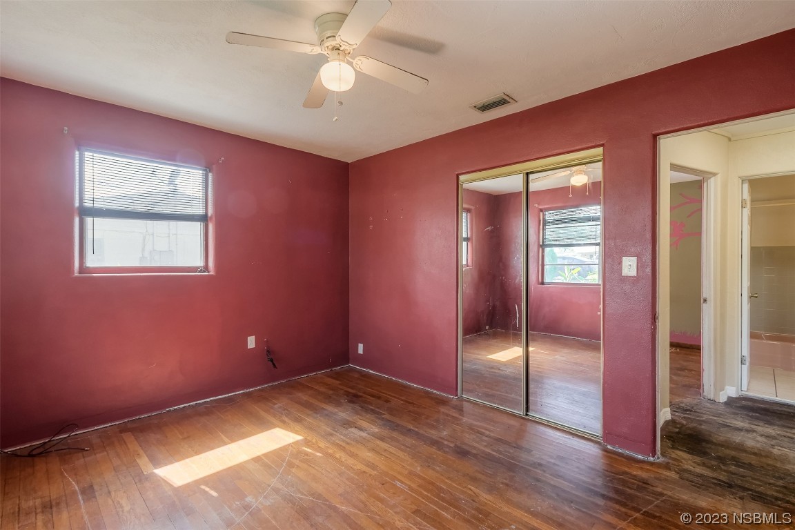 209 Pine Avenue Edgewater, FL 32141 - Photo 15 of 34 a view of empty room with wooden floor