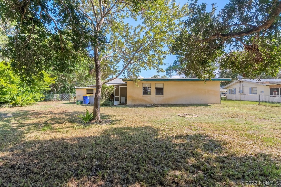 209 Pine Avenue Edgewater, FL 32141 - Photo 24 of 34 a backyard of a house