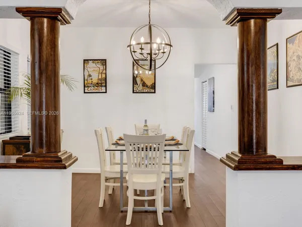 a kitchen with stainless steel appliances granite countertop a refrigerator a stove top oven a sink and dishwasher