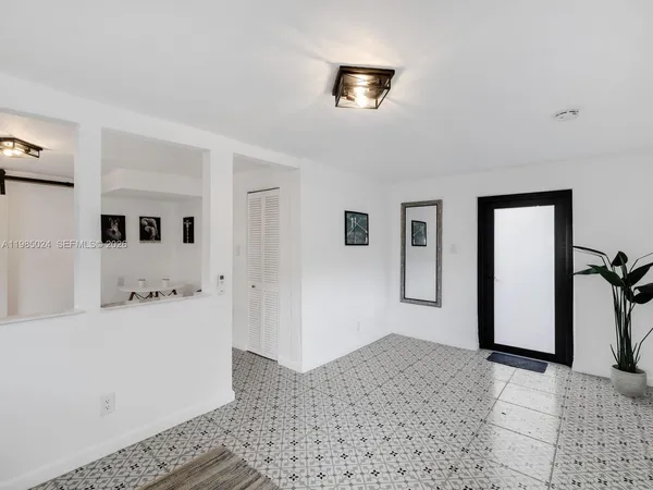 a bathroom with a sink a vanity and a mirror