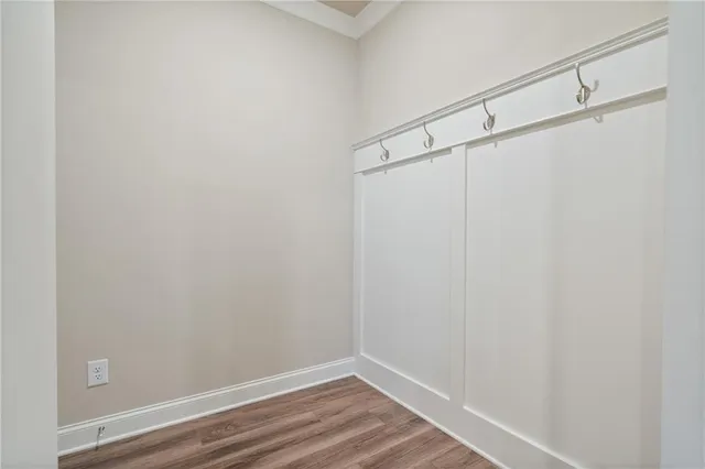 a view of a livingroom with workspace and a couch