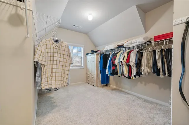 a bathroom with a toilet a sink and a bath tub