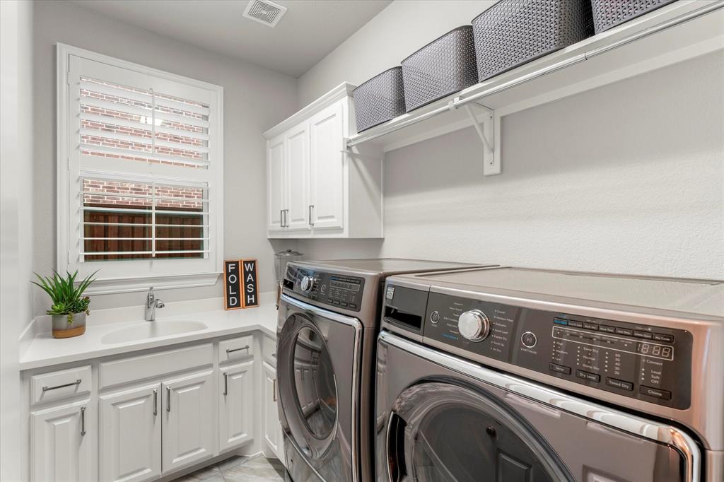3460 Redpine Drive Prosper, TX 75078 - Photo 20 of 40 Laundry room- you will want to do lots of laundry here!