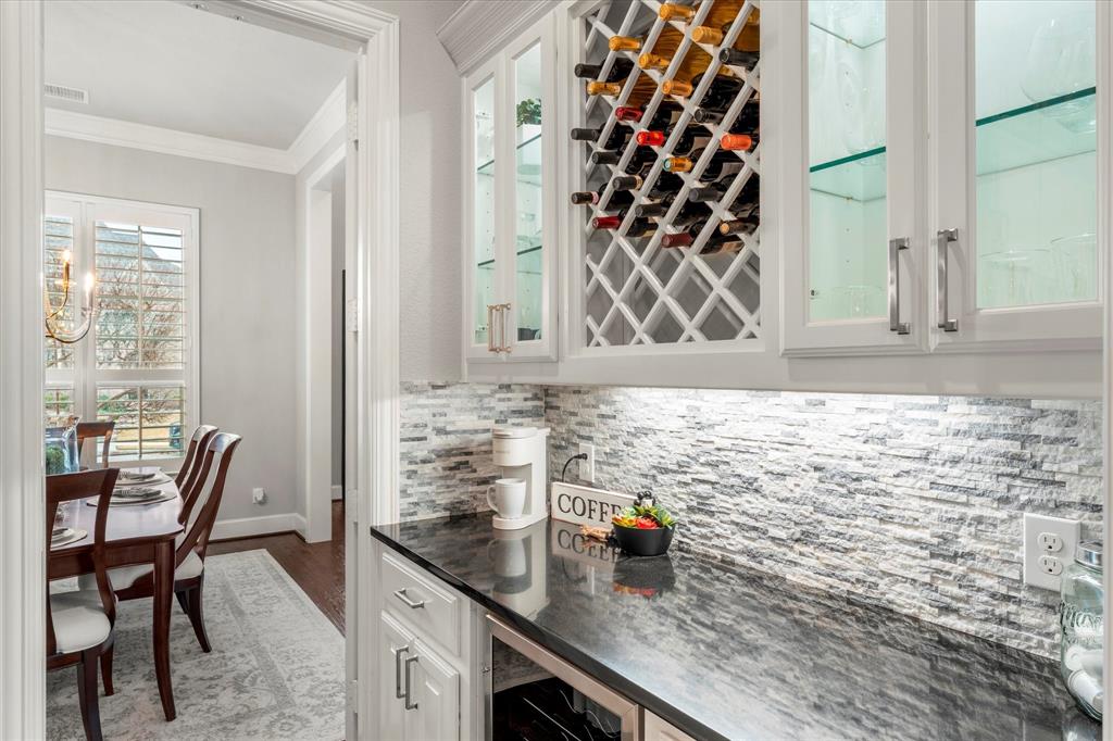 3460 Redpine Drive Prosper, TX 75078 - Photo 8 of 40 Butlers pantry with wine fridge...coffee or wine, great way to start and end the day.