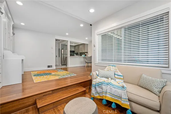 a living room with furniture and a table