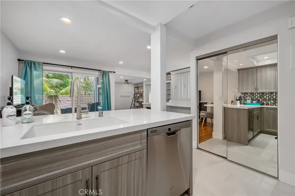 a kitchen with a sink and counter