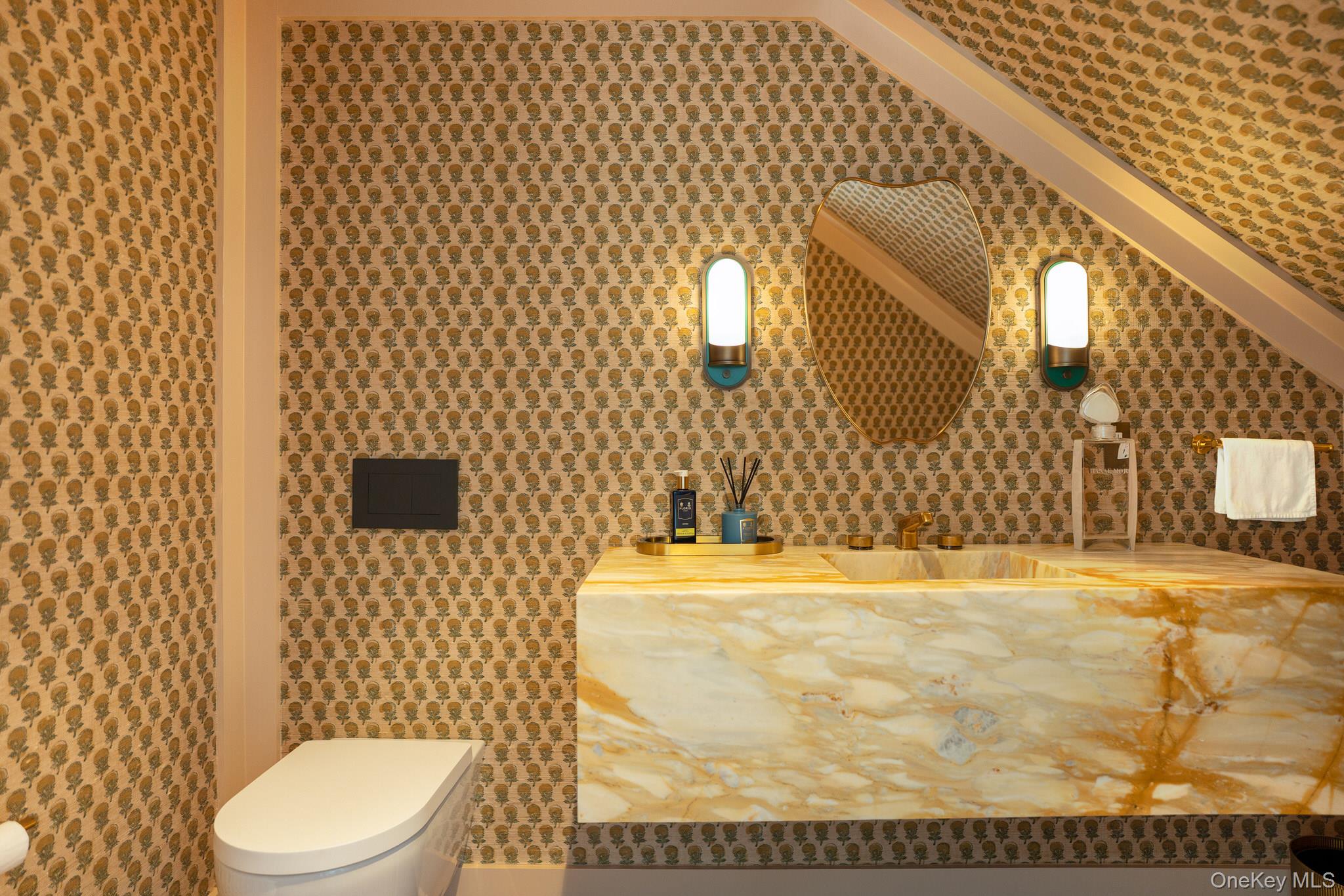 217 Hommocks Road Larchmont, NY 10538 - Photo 16 of 49 a bathroom with a sink toilet and mirror