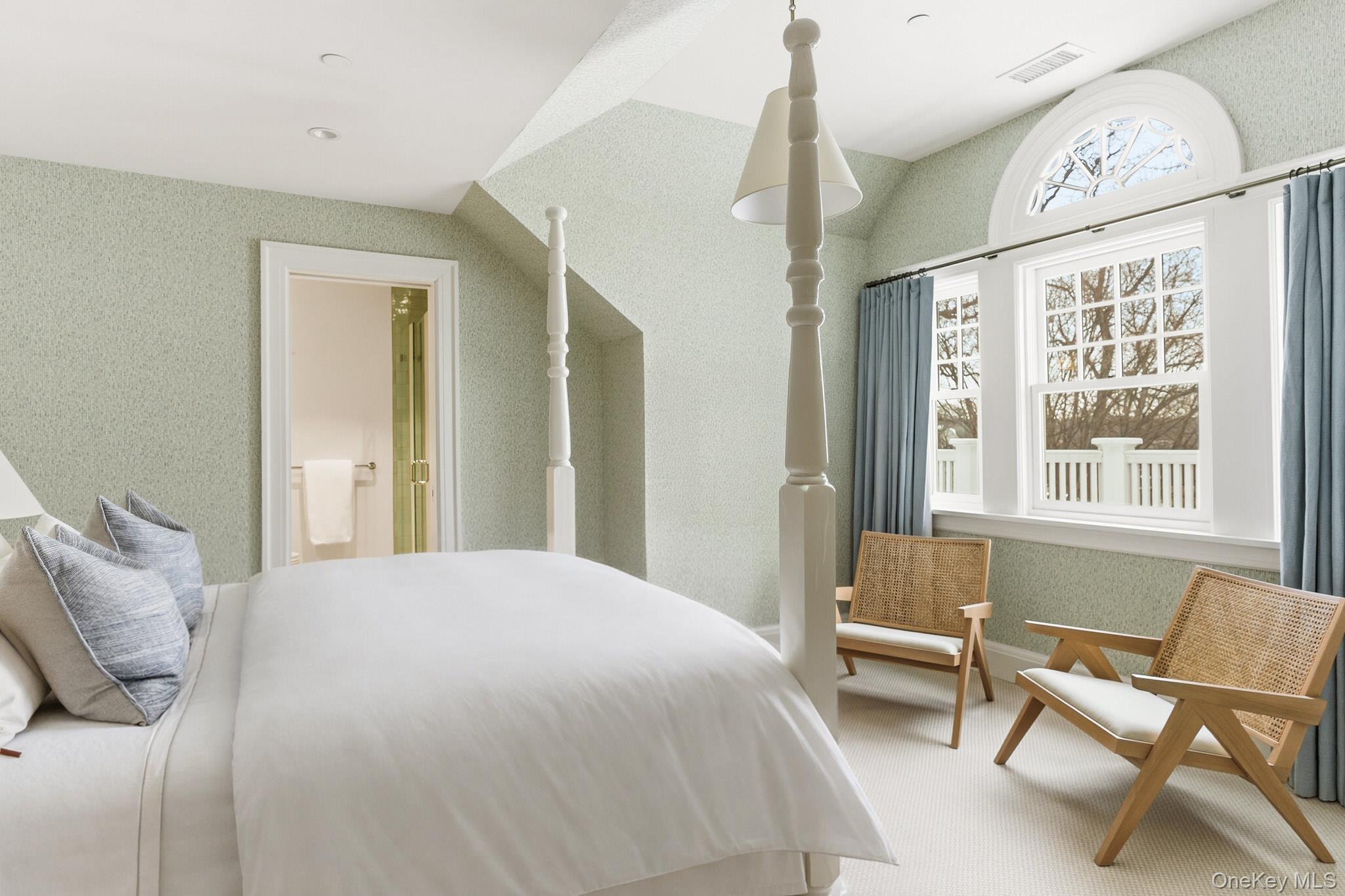 217 Hommocks Road Larchmont, NY 10538 - Photo 34 of 49 a bedroom with a bed and a window