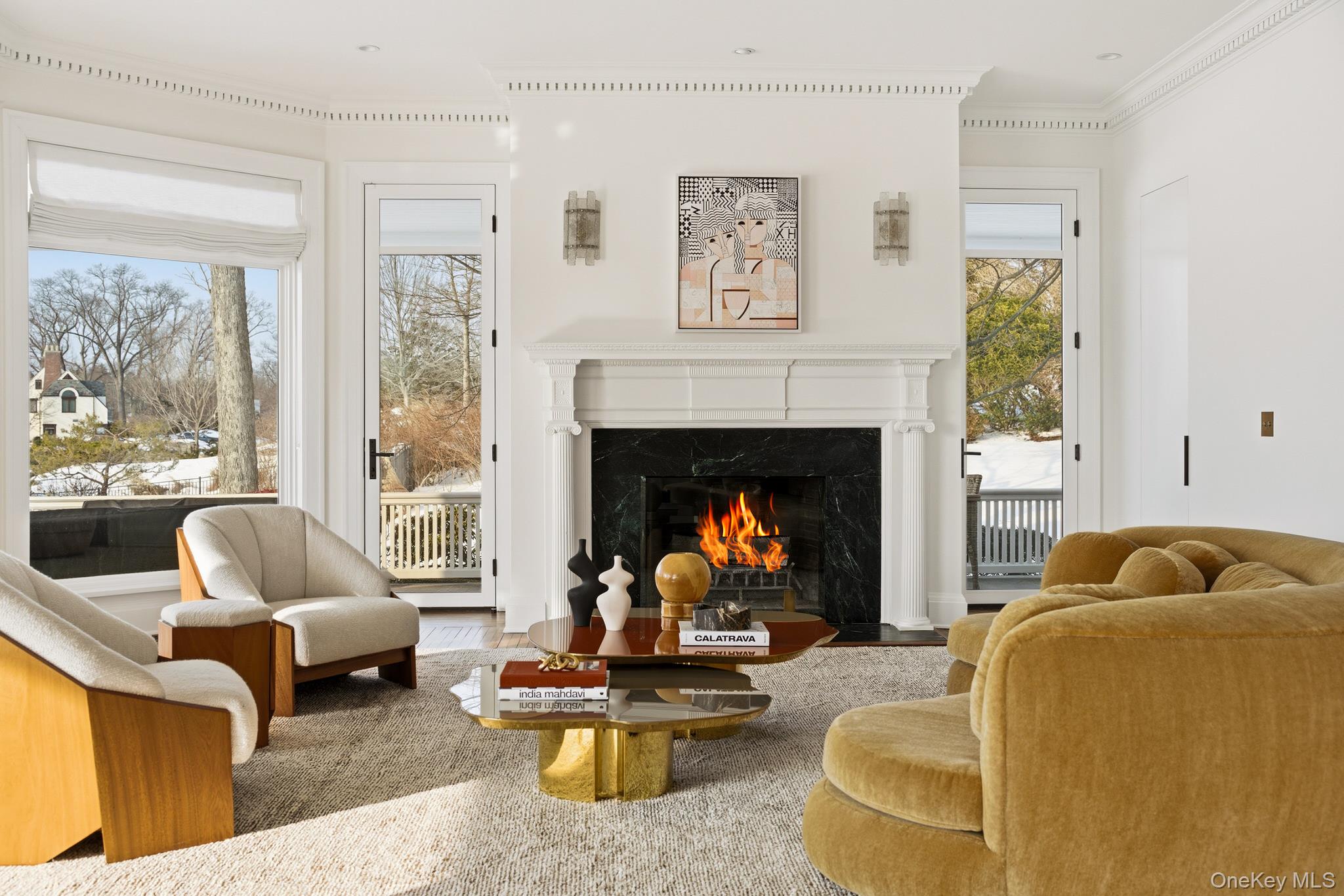 217 Hommocks Road Larchmont, NY 10538 - Photo 9 of 49 a living room with furniture and a fireplace