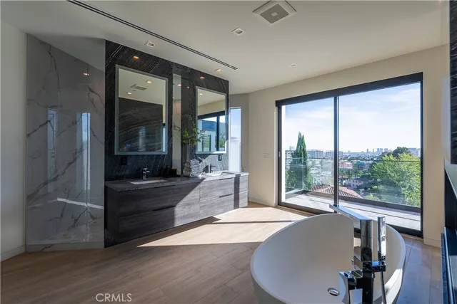 a kitchen with a refrigerator and a kitchen