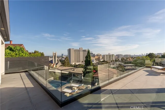 a view of a terrace with sitting area
