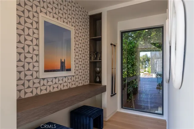 a bathroom with a granite countertop sink a mirror and shower