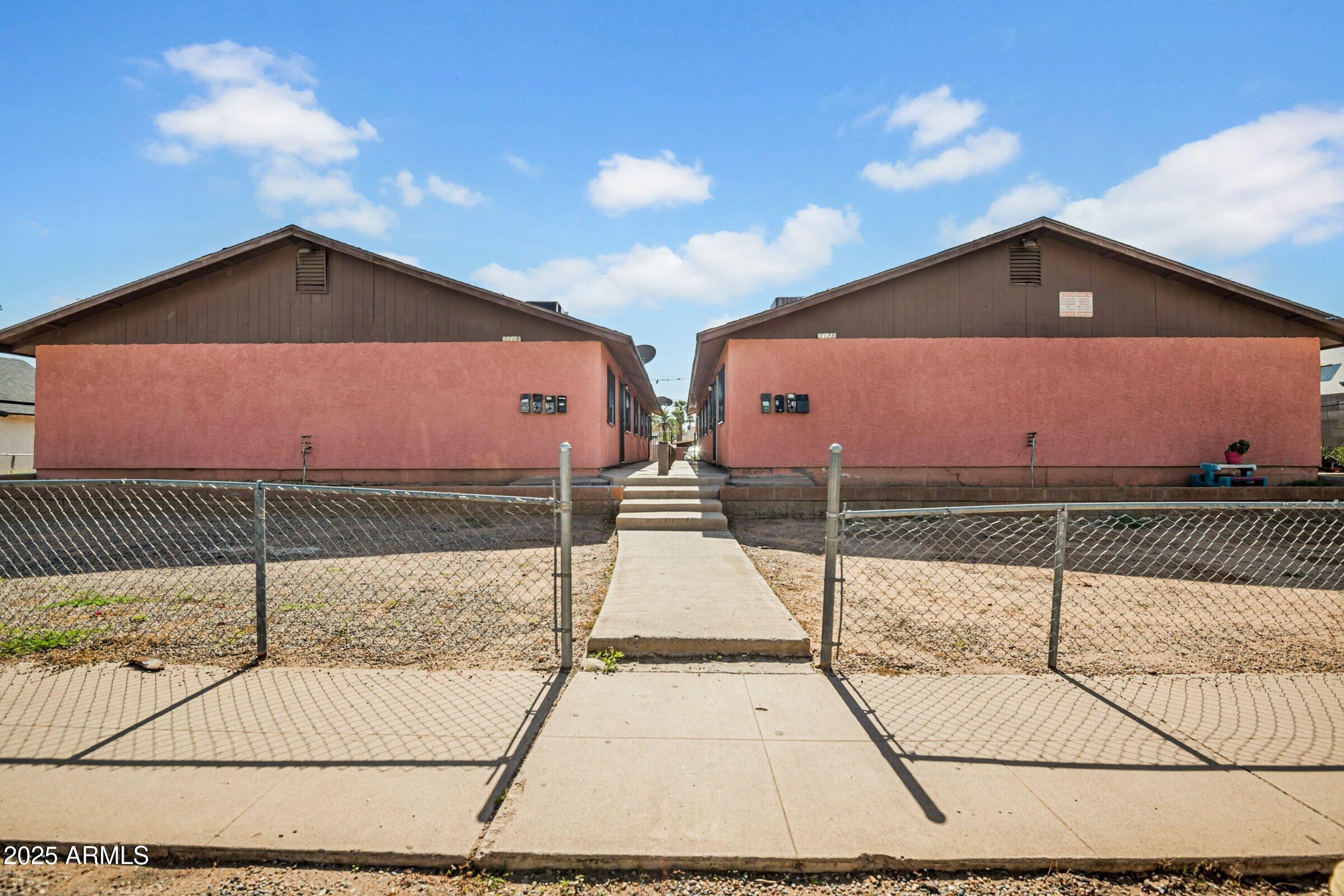 a front view of a house with a garage