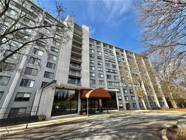 a front view of a building with street