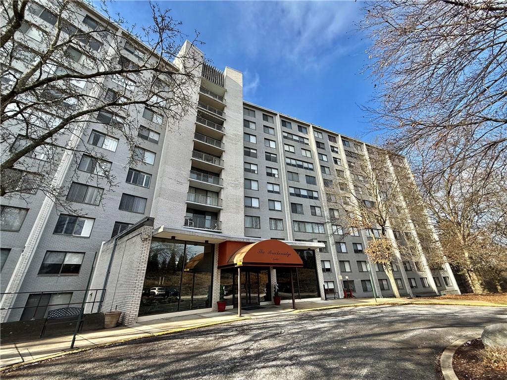 1160 Bower Hill Road, Unit 302C Mt. Lebanon, PA 15243 - Photo 1 of 39 a front view of a building with street