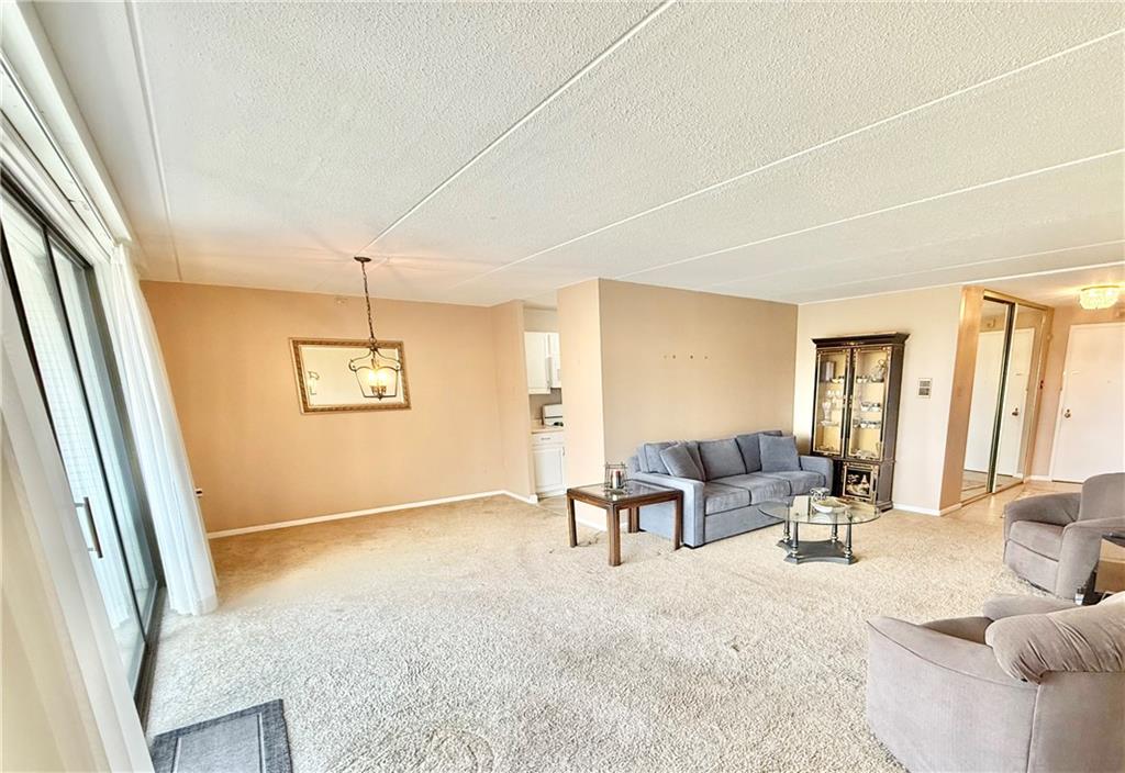 1160 Bower Hill Road, Unit 302C Mt. Lebanon, PA 15243 - Photo 11 of 39 a living room with furniture and a window