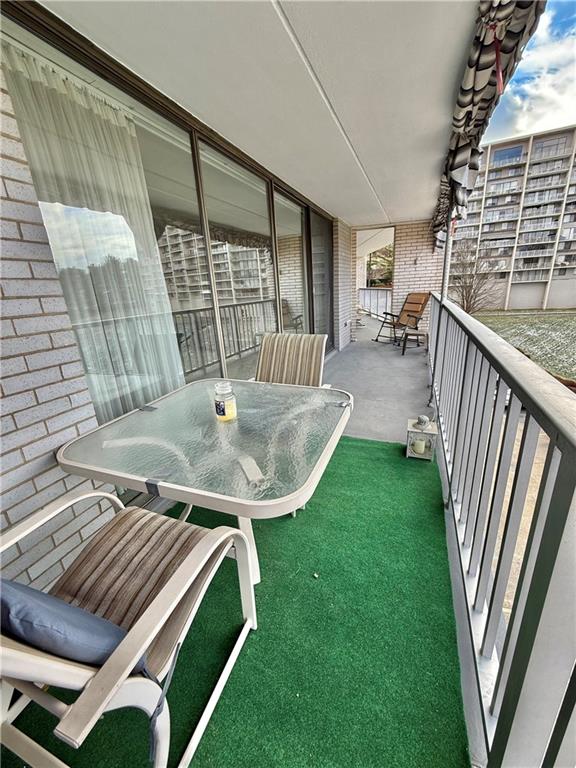 1160 Bower Hill Road, Unit 302C Mt. Lebanon, PA 15243 - Photo 23 of 39 a balcony with table and chairs