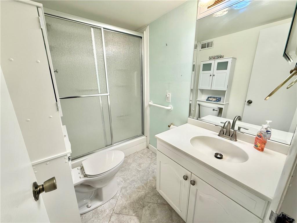 1160 Bower Hill Road, Unit 302C Mt. Lebanon, PA 15243 - Photo 31 of 39 a bathroom with a sink toilet and shower