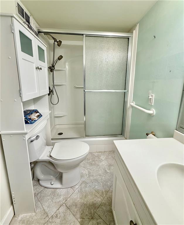 1160 Bower Hill Road, Unit 302C Mt. Lebanon, PA 15243 - Photo 32 of 39 a bathroom with a sink toilet and shower