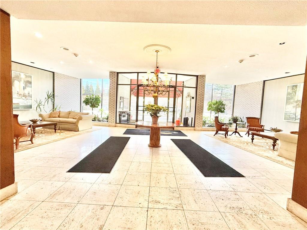 1160 Bower Hill Road, Unit 302C Mt. Lebanon, PA 15243 - Photo 4 of 39 a living room with furniture and a large window