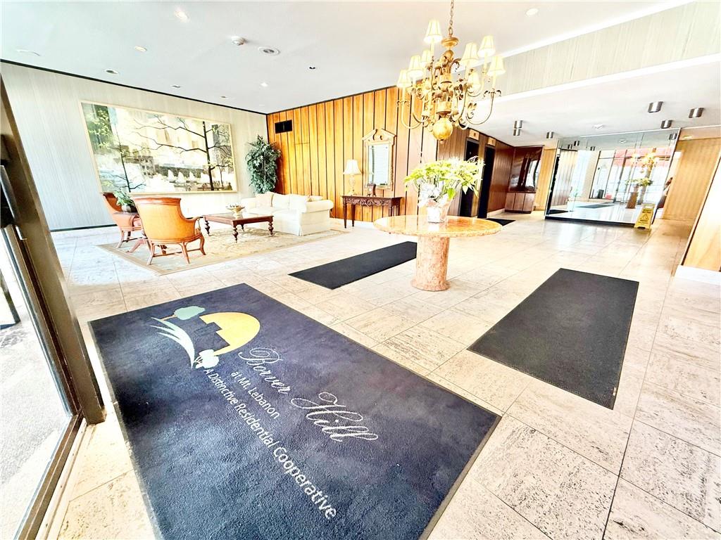 1160 Bower Hill Road, Unit 302C Mt. Lebanon, PA 15243 - Photo 5 of 39 a view of a living room with a large window